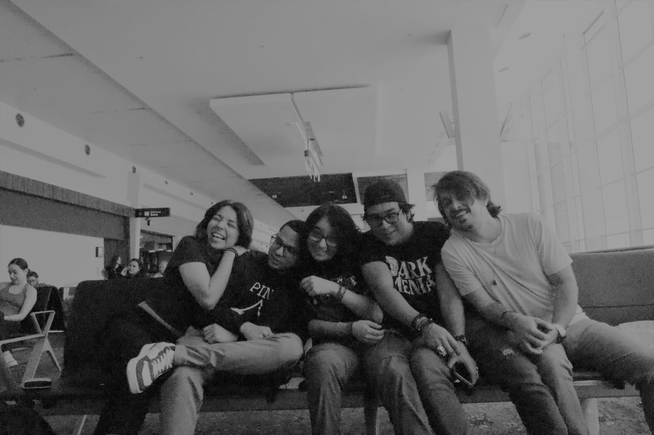 Darkmenia band at the airport during Argentina tour